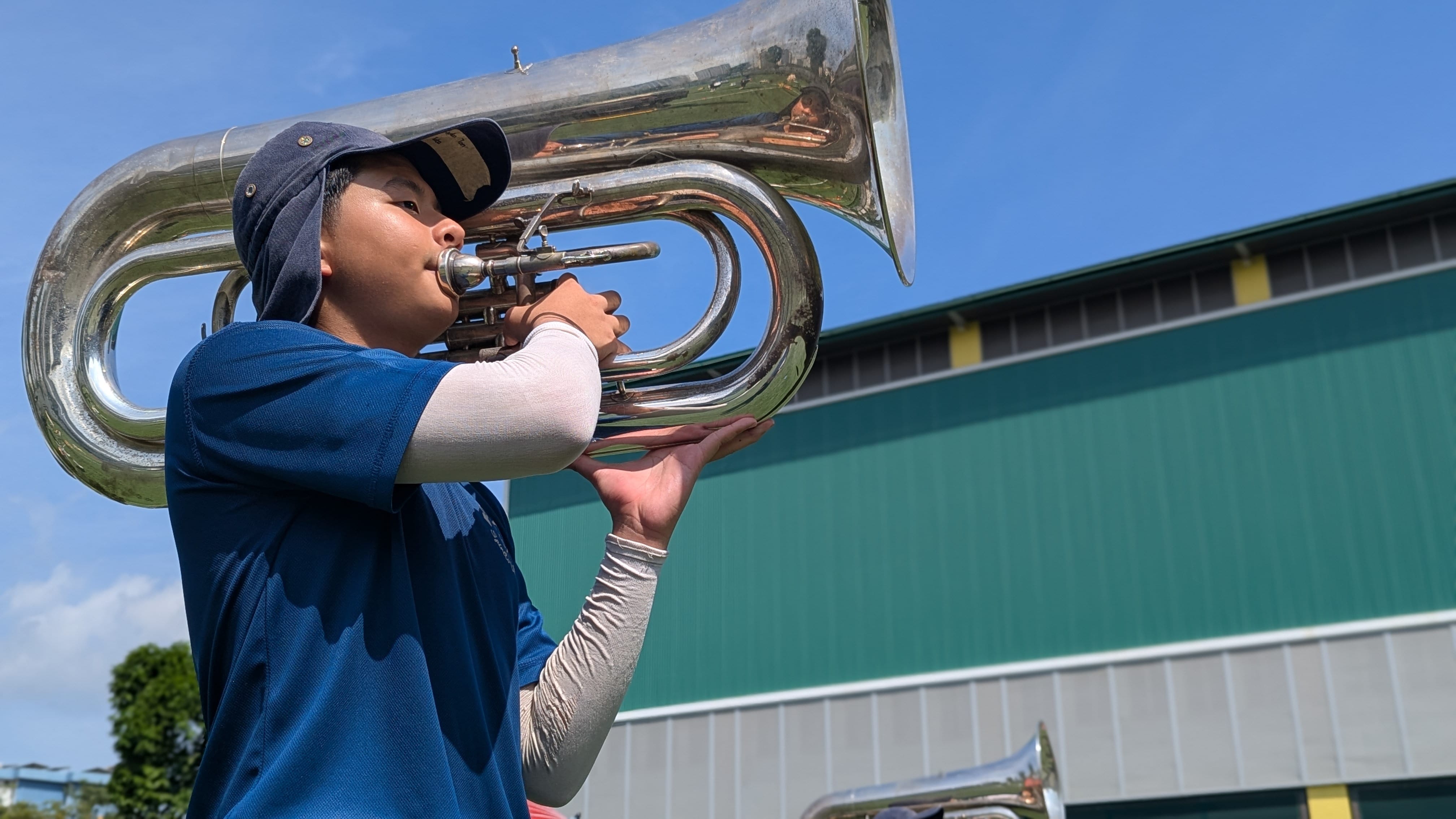 Boy playing trumpet.
